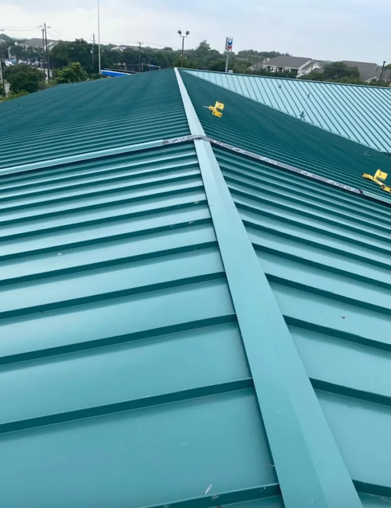 Green commercial metal roof ridge and valley for Metal Roof Repair in Shirley